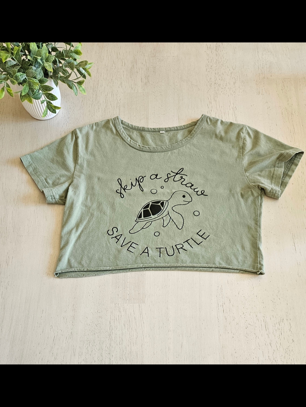 Green "Skip a Straw Save a Turtle" Crop Tee
